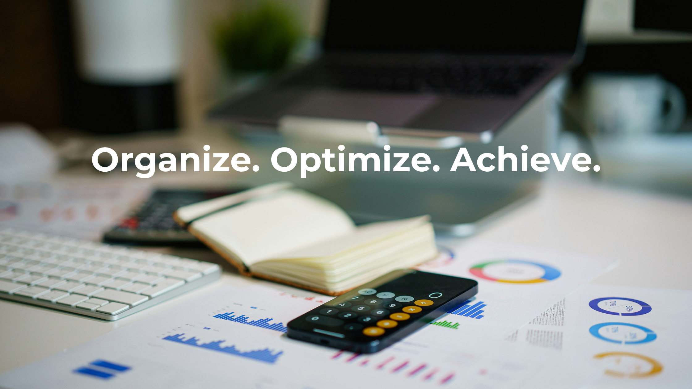 Desk with budgeting tools and financial charts illustrating the concept of Organize, Optimize, Achieve through 5S Lean Budgeting.